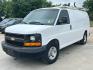 2014 White /Gray Chevrolet Express (1GCWGFCB5E1) , AUTOMATIC transmission, located at 17760 Hwy 62, Morris, OK, 74445, (918) 733-4887, 35.609104, -95.877060 - 2014 CHEVROLET EXPRESS CARGO VAN 6.0L V8 RWD FEATURING POWER LOCKS, POWER WINDOWS, MANUAL MIRRORS, MANUAL SEATS, AM/FM STEREO, LEATHER SEATS, LEATHER-WRAPPED STEERING WHEEL, TRACTION CONTROL, LOCKING METAL CONSOLE, STEEL SHELVES, SPLIT SWING-OUT RIGHT DOORS, AND TOW PACKAGE. EQUIPPED WITH A CNG FUE - Photo#0